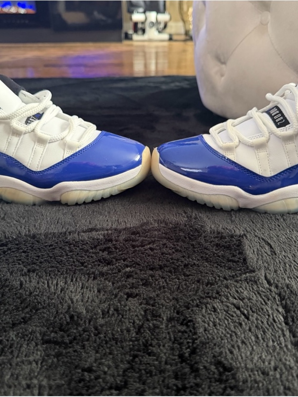 Jordan Women’s White and Blue Patent Leather Low-Top Sneakers